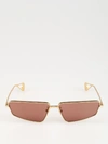 GUCCI GOLD-COLORED SUNGLASSES WITH RED LENSES