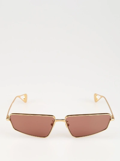 Gucci Gold-colored Sunglasses With Red Lenses