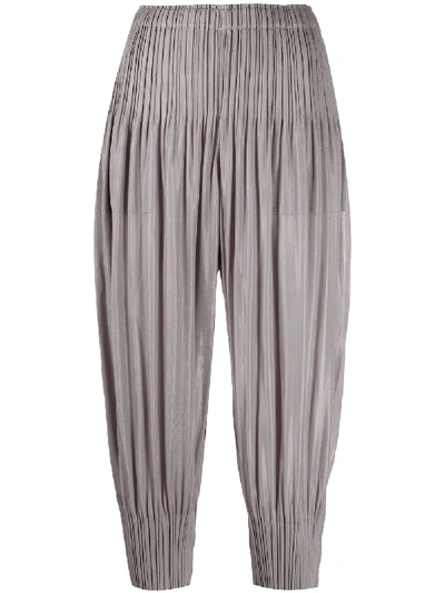 Issey Miyake Pleated Tapered Trousers In Grey