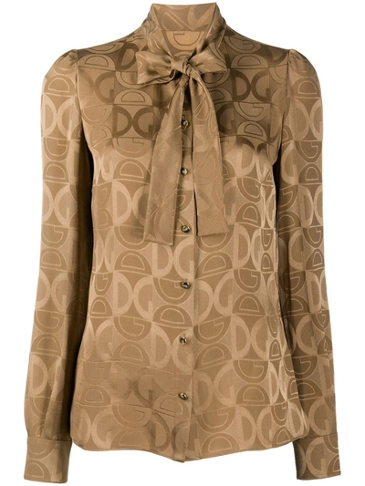 Dolce & Gabbana Pussy-bow Neck Logo Jacquard Silk Shirt In Beige,brown