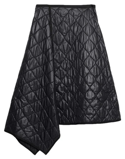 Juunj Midi Skirts In Black