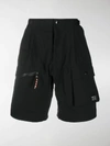 BURBERRY TECHNICAL COMBAT SHORTS,15775924