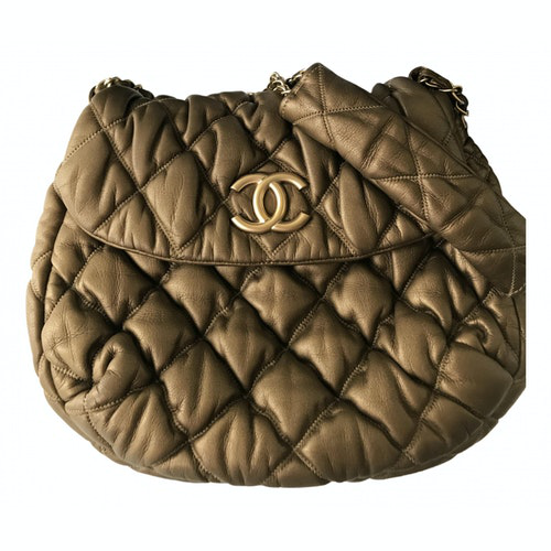 Pre-Owned Chanel Chain Around Gold Leather Handbags | ModeSens