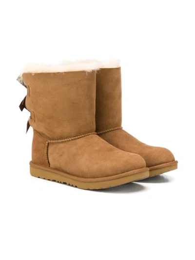 Ugg Teen Bow Detail Shearling Boots In Brown