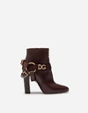 DOLCE & GABBANA ANKLE BOOTS IN COWHIDE WITH DG BRACKET LOGO