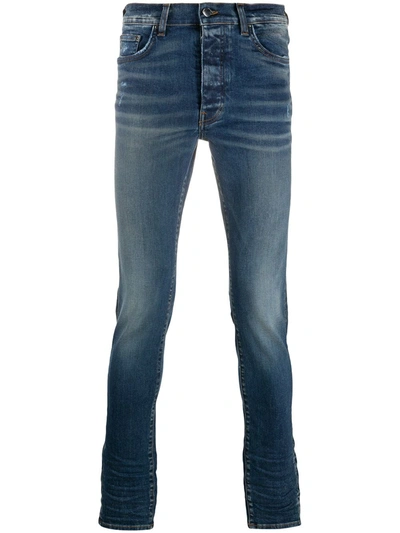 Amiri Stack Mid-rise Skinny Jeans In Blue