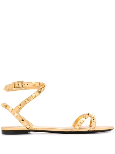 Valentino Garavani Rockstud Flat Sandals In Gold