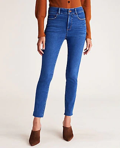 Ann Taylor Curvy Sculpting Pocket Mid Rise Skinny Jeans In Mid Stone Wash