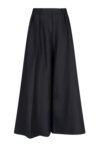 Khaite Virginie Asymmetric Silk-crepe Wide-leg Pants In Black