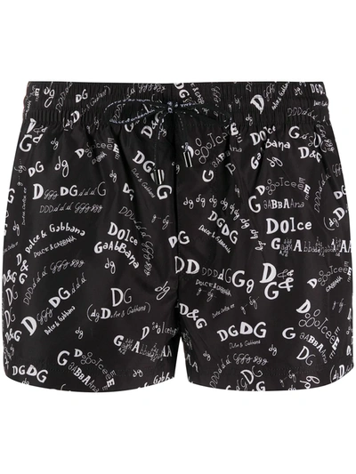 Dolce & Gabbana All-over Logo Print Swim Shorts In Black