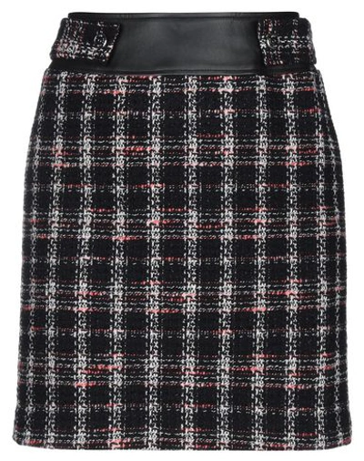 Maje Mini Skirts In Black