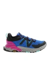 NEW BALANCE PAINTED EFFECT SNEAKERS IN BLUE AND BLACK