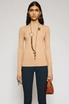 ACNE STUDIOS Mock neck ribbed sweater Cream beige