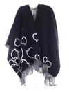 MONCLER CAPE FEATURING BLACK AND WHITE FRINGES