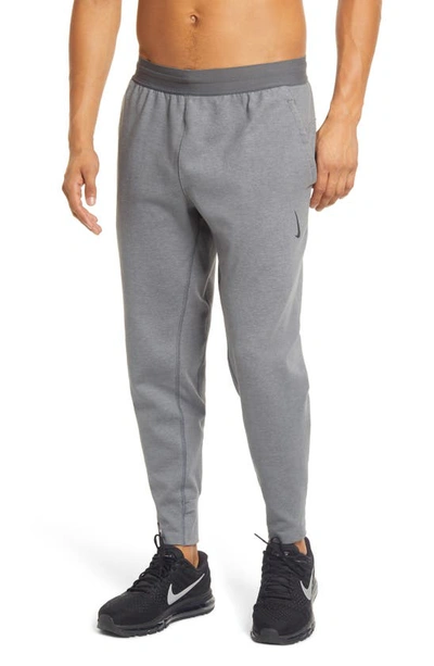NIKE RESTORE DRI-FIT POCKET FLEECE YOGA PANTS CU6782