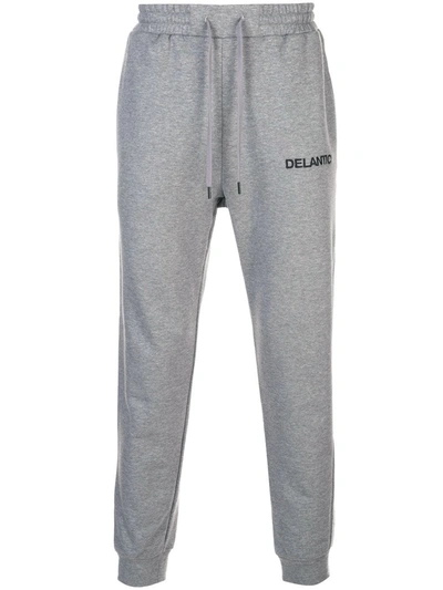 Delantic Logo Embroidered Trackpants In Grey
