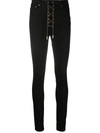 GARCONS INFIDELES LACE-UP SKINNY JEANS