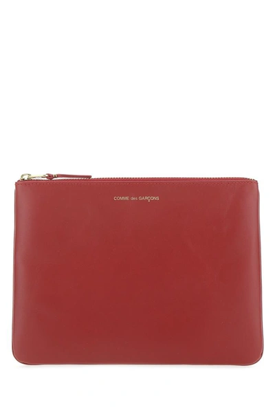 Comme Des Garçons Wallet Logo Print Clutch Bag In Red