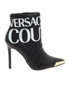 VERSACE JEANS COUTURE MAXI LOGO PRINT ANKLE BOOTS IN BLACK