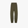 GANNI GREEN CRINKLED TRACK trousers,F5605CRINKEDTECH15258819