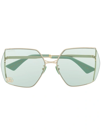 Gucci Oversized-frame Tinted Sunglasses In Gold