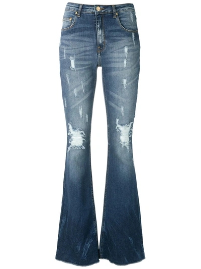 Amapô Maine Flared Denim Trousers In Blue