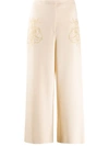 Moschino Embroidered Cupid Cropped Trousers In Neutrals