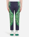 DOLCE & GABBANA STRETCH COTTON PANTS WITH PEACOCK PRINT