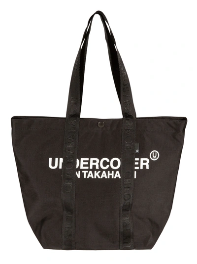 Undercover Logo Printed Shopper Bag In Black/white