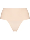 Spanx Undie-tectable High-rise Smoothing Thong In Powder