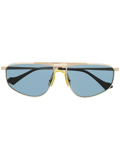 Gucci Oval Frame Sunglasses In Gold