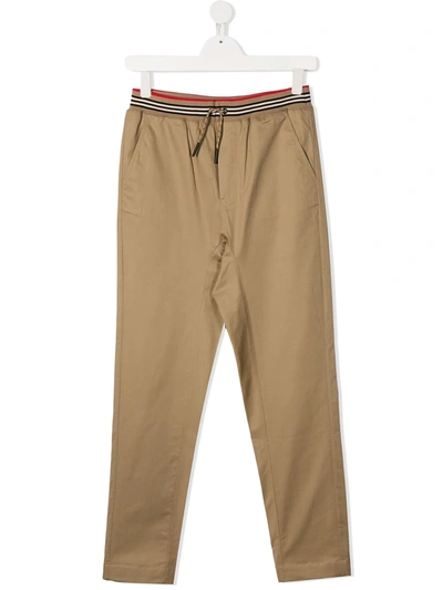 Burberry Teen Icon Stripe Drawcord Trousers In Brown