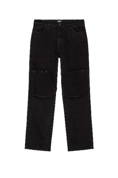 Raf Simons Relaxed Fit Denim Trousers With Cut Out Knee Patches In Black