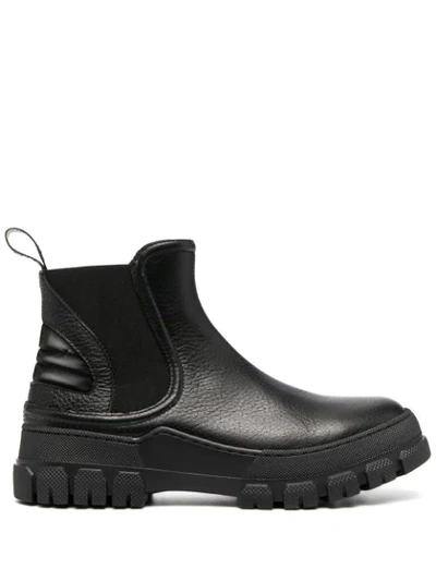 Pollini Track Sole Ankle Boots In Black