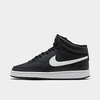 Nike Black Canvas Sb Charge Mid Sneakers In Black