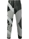 ISSEY MIYAKE ABSTRACT-PRINT PLEATED TROUSERS