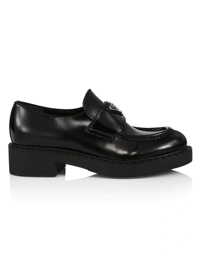 Prada Enamel Triangle Logo Plaque Loafers In Nero