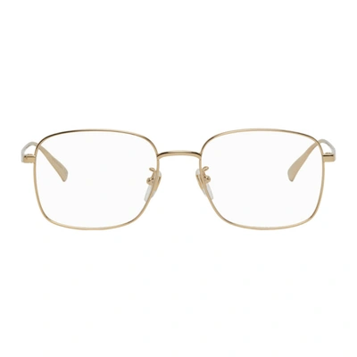 Gucci Gold Round Glasses In 002 Gold