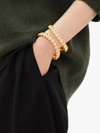 Jw Anderson Crystal Loop Cuff Bracelet In Gold