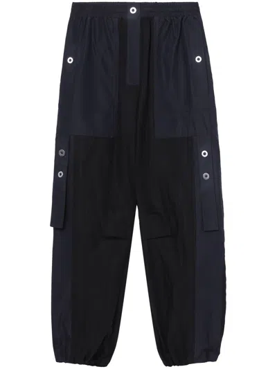 3.1 Phillip Lim Contrasting-pocket Trousers In Schwarz