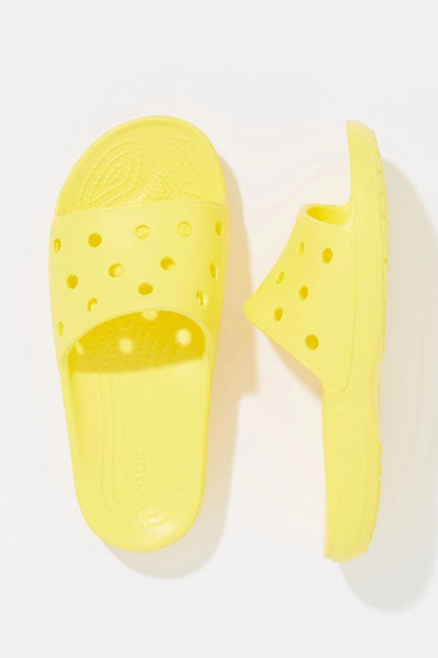 Crocs Classic Slide Sandals In Yellow