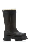 PRADA MONOLITH SHEARLING-TRIMMED LEATHER BOOTS