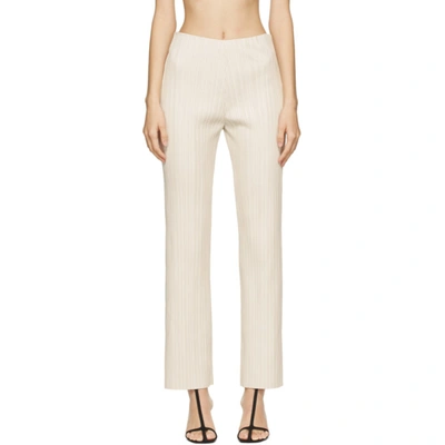 Nanushka Char Pleated Vegan Leather Straight-leg Pants In Beige