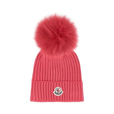 Moncler Woollen Hat With A Fur Bobble In Blue
