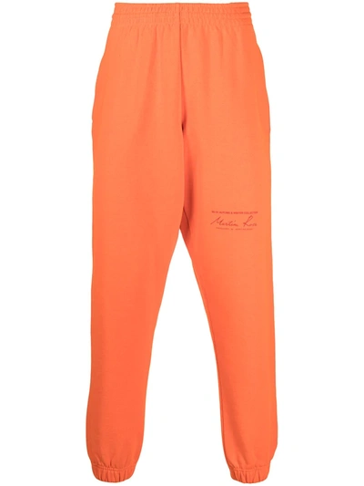 Martine Rose Logo Print Track Trousers In Orange