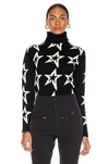 Perfect Moment Star Dust Intarsia Merino Wool Turtleneck Sweater In Black & Snow White Star
