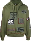 Ktz Patch-detailed Drawstring Hoodie In Green