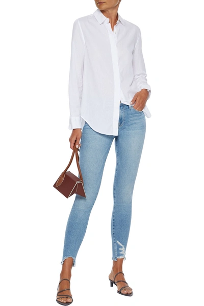 Frame Le Skinny De Jeanne Cropped Distressed Mid-rise Skinny Jeans In Light Denim