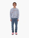 Jw Anderson Slim-fit Raw Hemmed Jeans In Blue