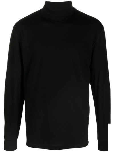 A Kind Of Guise Trinity Roll-neck Merino Jumper In Black